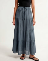 Olivia A-Line Skirt in blue — tiered maxi skirt, front view on model