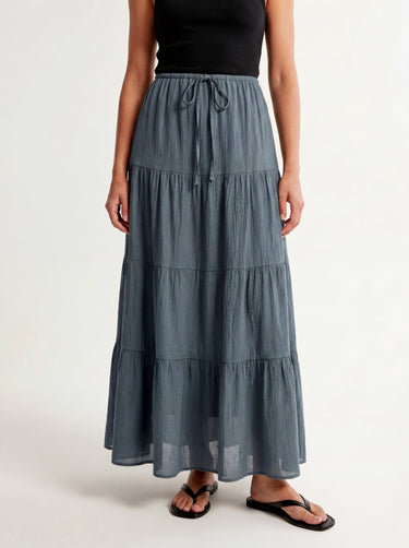 Olivia A-Line Skirt in blue — tiered maxi skirt, front view on model
