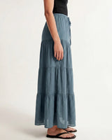 Olivia A-Line Skirt in blue — tiered maxi skirt, side view on model