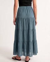 Olivia A-Line Skirt in blue — tiered maxi skirt, back view on model