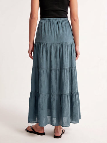 Olivia A-Line Skirt in blue — tiered maxi skirt, back view on model