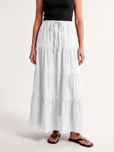 Olivia A-Line Skirt in white — tiered maxi skirt, front view on model