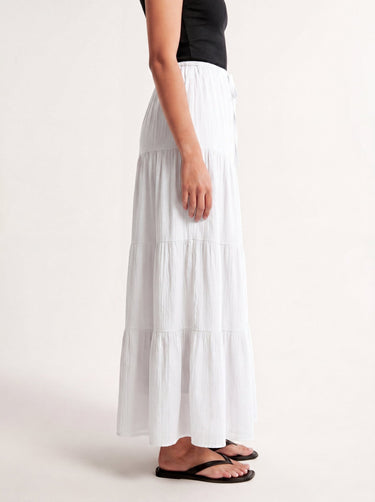 Olivia A-Line Skirt in white — tiered maxi skirt, side view on model