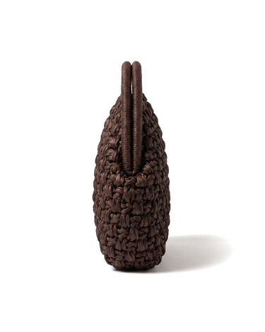 The Ravello Woven Clutch in brown, side profile view showing the slim depth
