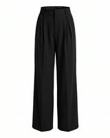 Riviera Tailored Pants in black — high-waist wide-leg pleated tailored pants with pockets, product flat-lay