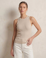 Ryah Ribbed Knit Vest Top in beige — fitted ribbed knit tank, three-quarter front view on model