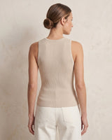 Ryah Ribbed Knit Vest Top in beige — sleeveless ribbed knit top, back three-quarter view on model