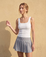 Sabrine Square Neck Tank in white — full-length front view on model against a sunlit wall