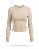 Beige fitted long-sleeve crew-neck top with ruched cuffs, flat-lay front view – Moriel Heritage