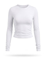White fitted long-sleeve crew-neck top with ruched cuffs, flat-lay front view – Moriel Heritage