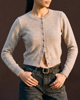 Short Knitted Cardigan in beige — front view on model
