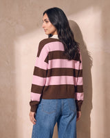 Striped Knit Polo Sweater in pink and cocoa — back view over-shoulder glance showing rear stripes