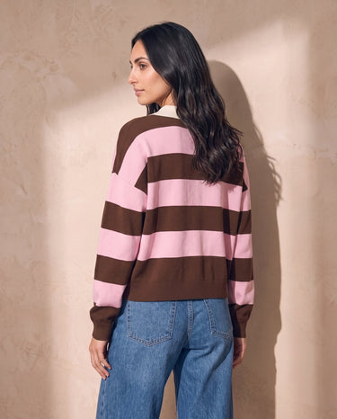 Striped Knit Polo Sweater in pink and cocoa — back view over-shoulder glance showing rear stripes