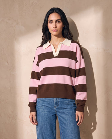 Striped Knit Polo Sweater in pink and cocoa on model — oversized boxy knit polo with cream collar, worn with wide-leg jeans