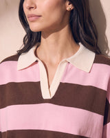 Striped Knit Polo Sweater in pink and cocoa — close-up of the cream contrast collar and open placket