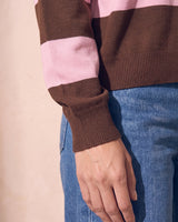 Striped Knit Polo Sweater in pink and cocoa — close-up of the ribbed cuff and stripe detail