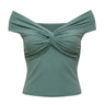 Green off-shoulder top with twist front detail, flat lay on white – Moriel Heritage