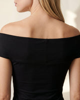 Close-up of the black top's back neckline across the shoulder blades – Moriel Heritage