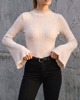 Sylvie Body Suit in white — front view on model