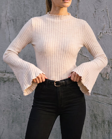 Sylvie Body Suit in white — front view on model