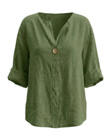 The Aire Relaxed Shirt in green — relaxed V-neck long-sleeve shirt with wood button front, product flat-lay