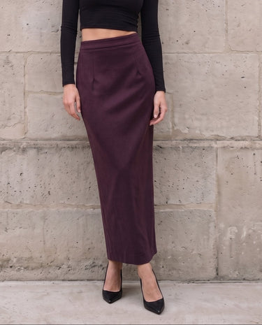 The Aisla Burgundy Skirt in burgundy — high-waisted straight maxi skirt, front view on model