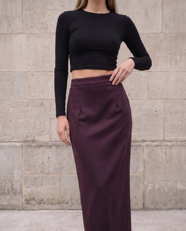 The Aisla Burgundy Skirt in burgundy — high-waisted straight maxi skirt, front view on model