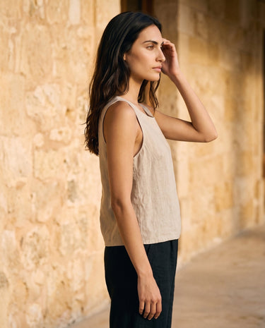 The Alba Linen Tank in khaki — linen tank, side view on model
