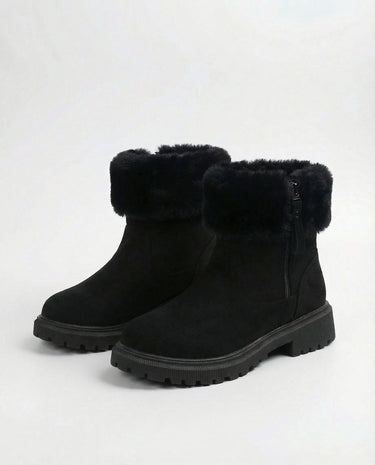 The Alba Plush Winter Boots in black — winter boots with plush fur cuff, angled view
