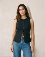 The Alicia vest in black — front view on model