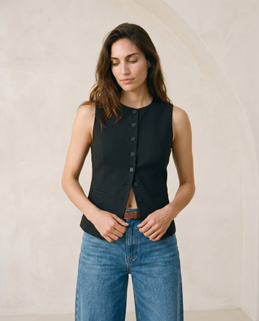 The Alicia vest in black — front view of the open vest on model