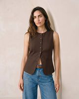 The Alicia vest in brown — front view on model