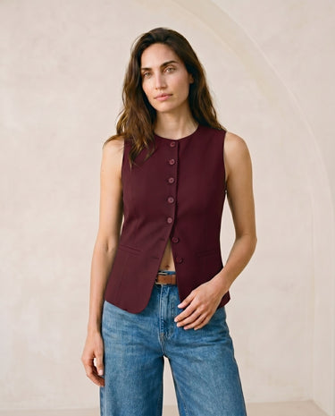 The Alicia vest in burgundy — front view on model