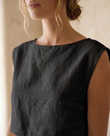 The Alora Linen Blend Set in black — close-up of sleeveless boat-neck top