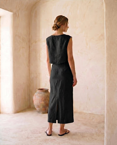 The Alora Linen Blend Set in black — linen-blend top and maxi skirt, back view on model
