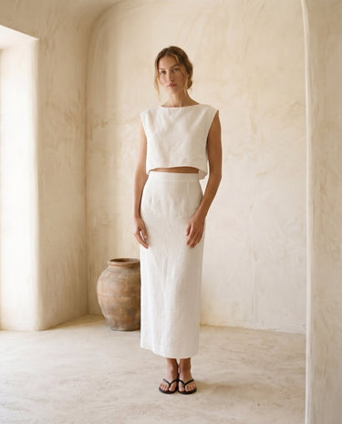 The Alora Linen Blend Set in white — linen-blend top and maxi skirt, front view on model