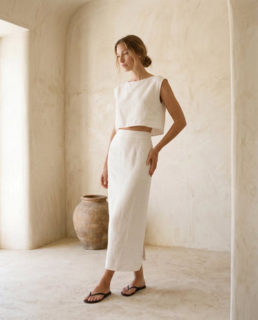 The Alora Linen Blend Set in white — linen-blend two-piece set, side styling view on model