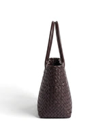 The Amalfi Woven Tote in brown, side profile view showing the depth of the tote