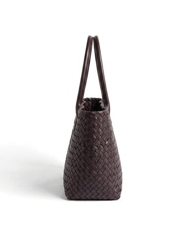 The Amalfi Woven Tote in brown, side profile view showing the depth of the tote