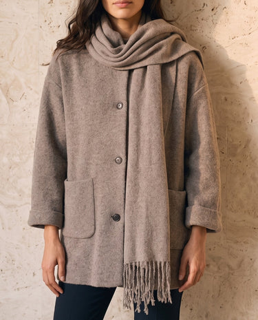 The Aria Scarf Cape Coat in khaki — coat with draped scarf cape, front view on model