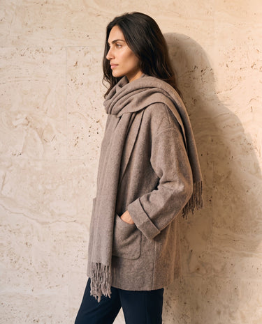 The Aria Scarf Cape Coat in khaki — coat with scarf cape, side view on model
