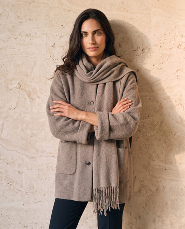 The Aria Scarf Cape Coat in khaki — coat with scarf cape, front view on model