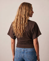 Back view of the brown ruched-side tee showing the dolman sleeves – Moriel Heritage