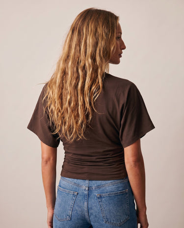Back view of the brown ruched-side tee showing the dolman sleeves – Moriel Heritage