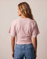 Back view of the pink ruched-side tee showing the dolman sleeves – Moriel Heritage