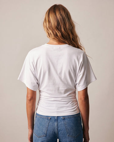 Back view of the white ruched-side tee showing the dolman sleeves – Moriel Heritage