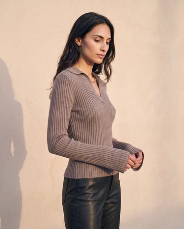 The Avery Knitted Sweater in brown — side view on model