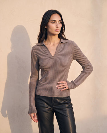 The Avery Knitted Sweater in brown — front view on model
