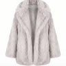 The Ballerina Faux Fur Coat in light gray, flat lay front view with wide notch collar and open front