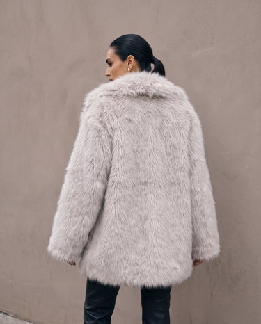 Back view of the light gray Ballerina Faux Fur Coat on model